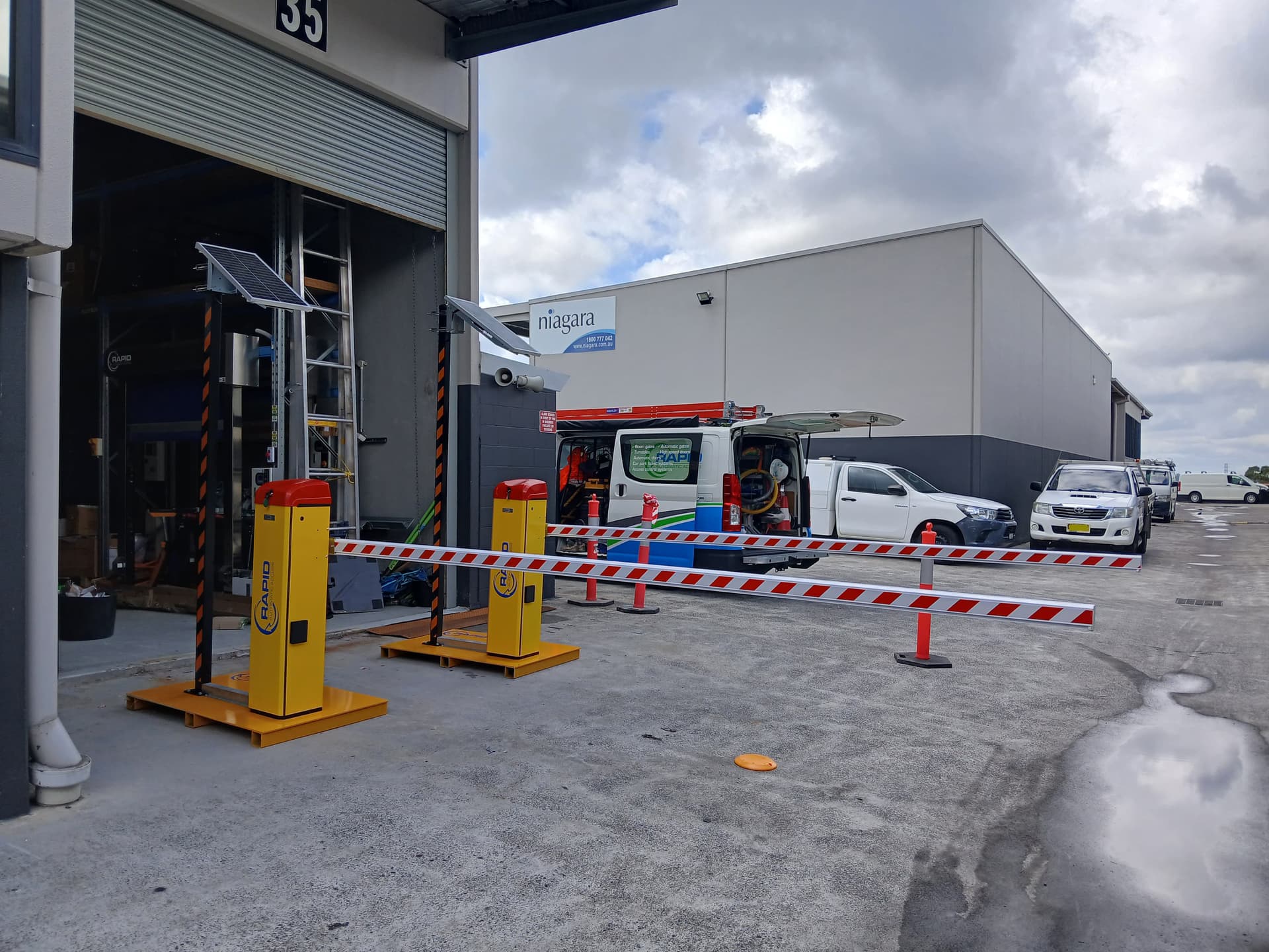 Two mobile Bob the Boom Gate units deployed at an industrial facility