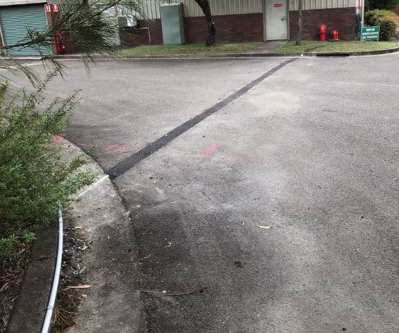 Electrical work showing the high-quality end result of external ducting run along a landscape curb and underground ducting in the driveway.