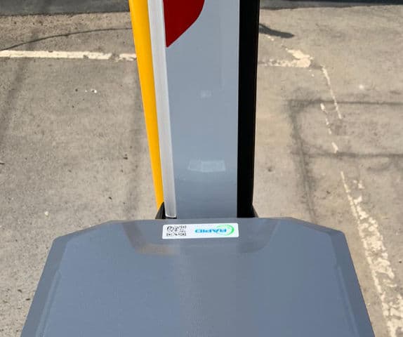 A close-up of a motor cabinet and upright arm.