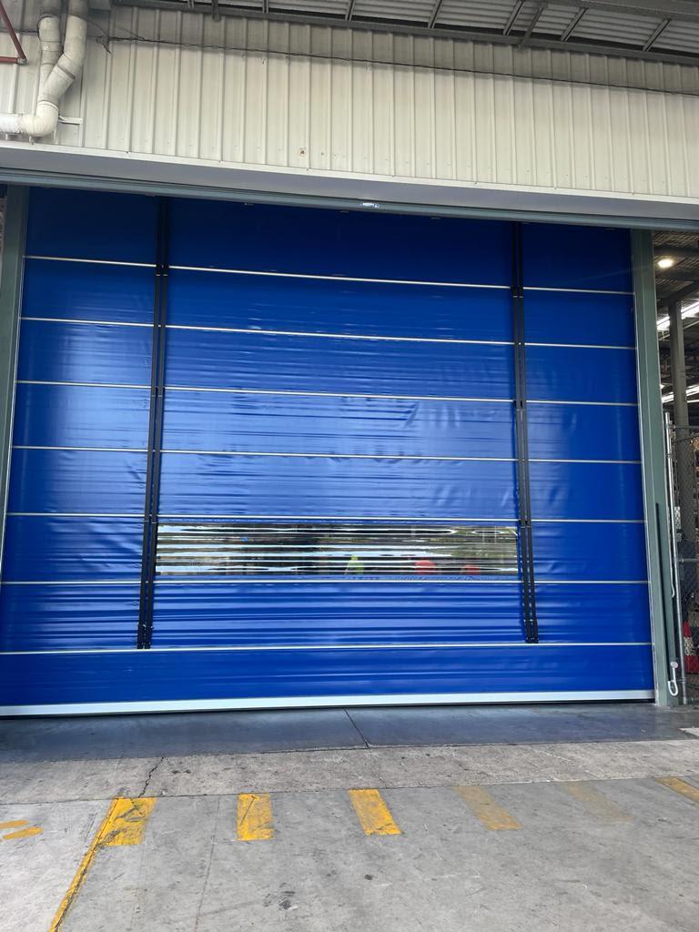 Large warehouse high-speed door at customs depot.