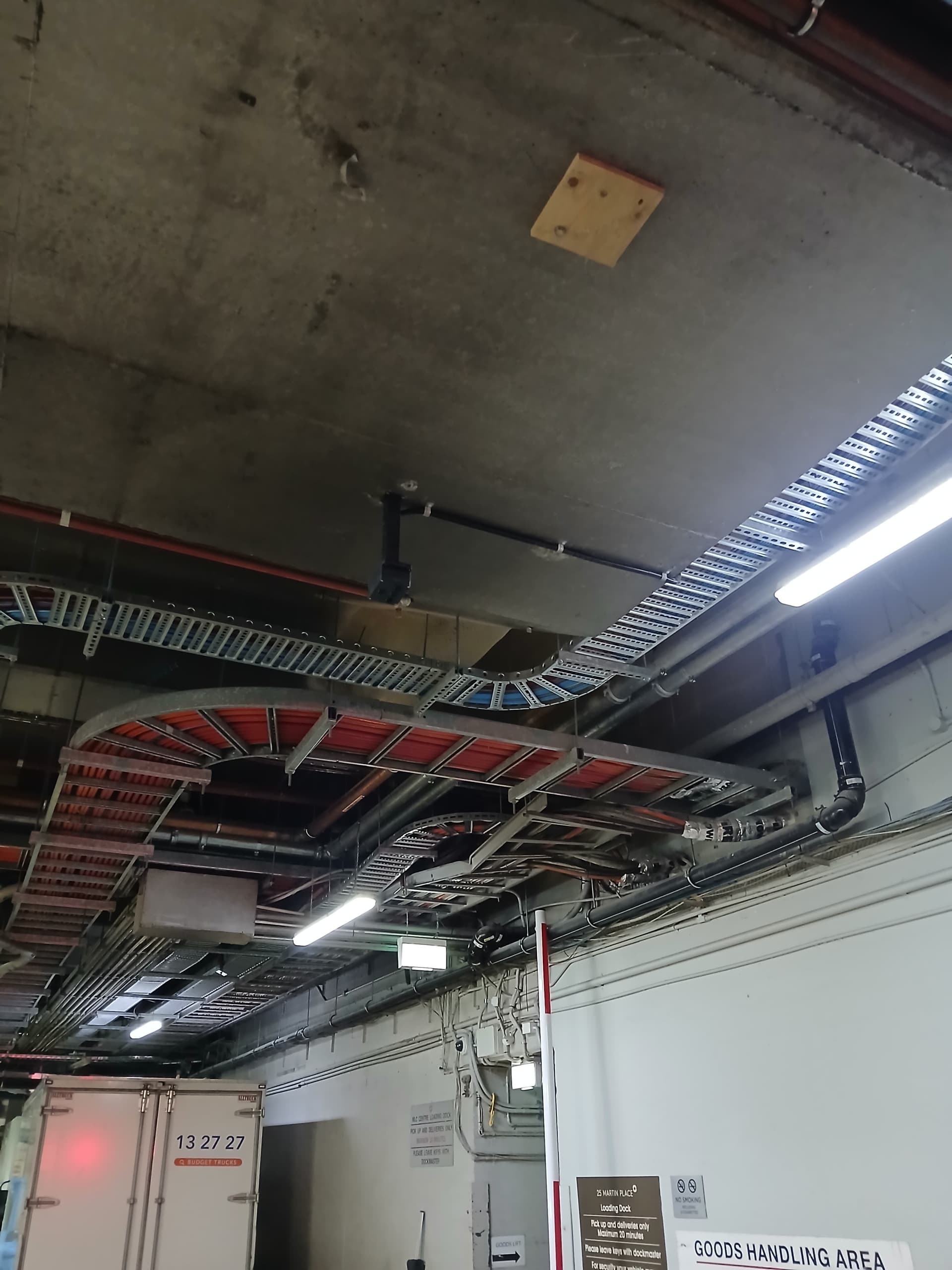 Car park traffic light wiring and cable tray installation.