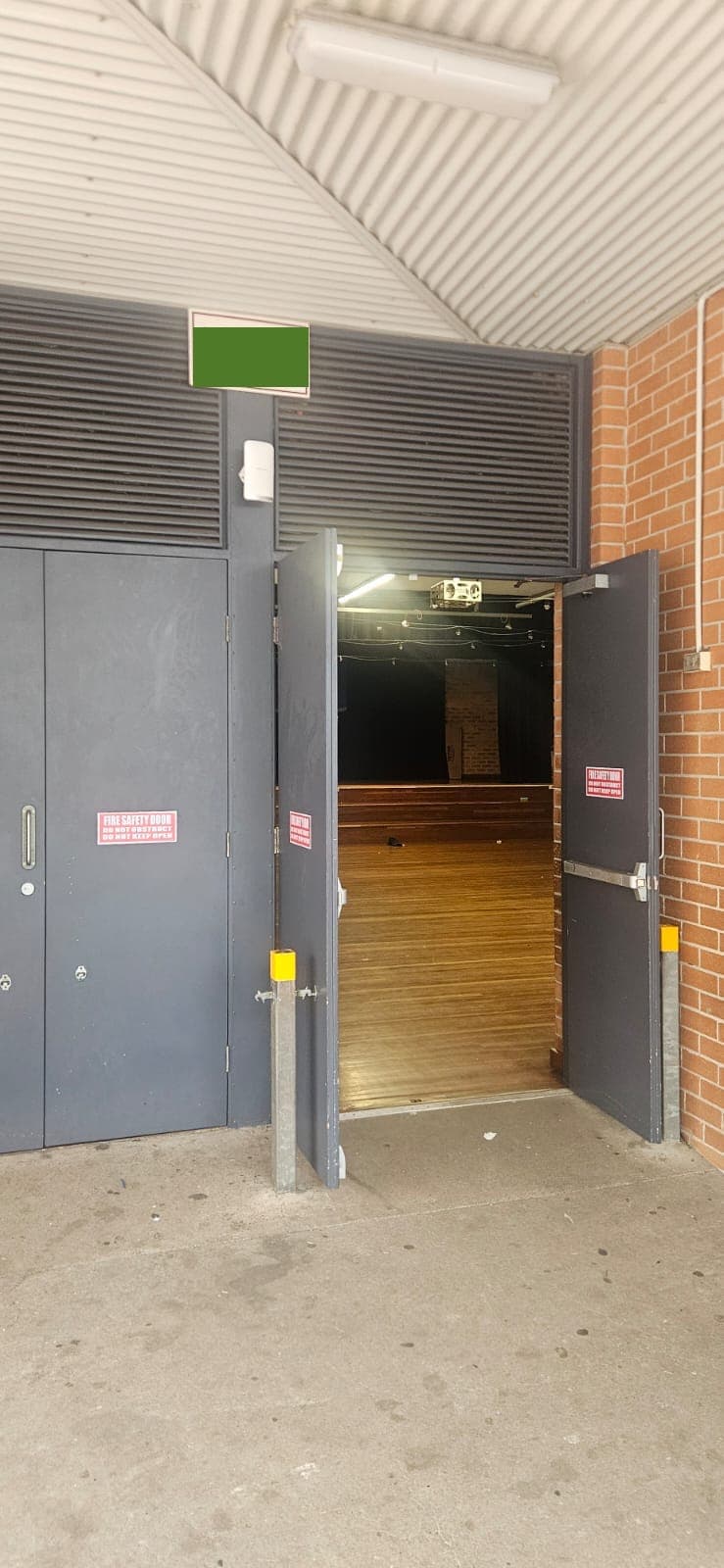 Access controlled pedestrian entry at a school building.