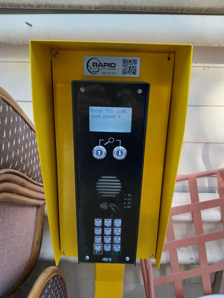 Intercom keypad pedestal for controlled vehicle access.