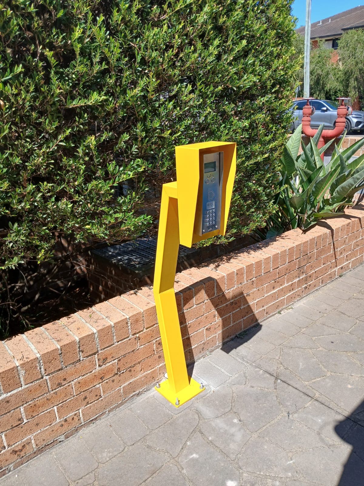 Keypad access control pedestal for driveway gates.