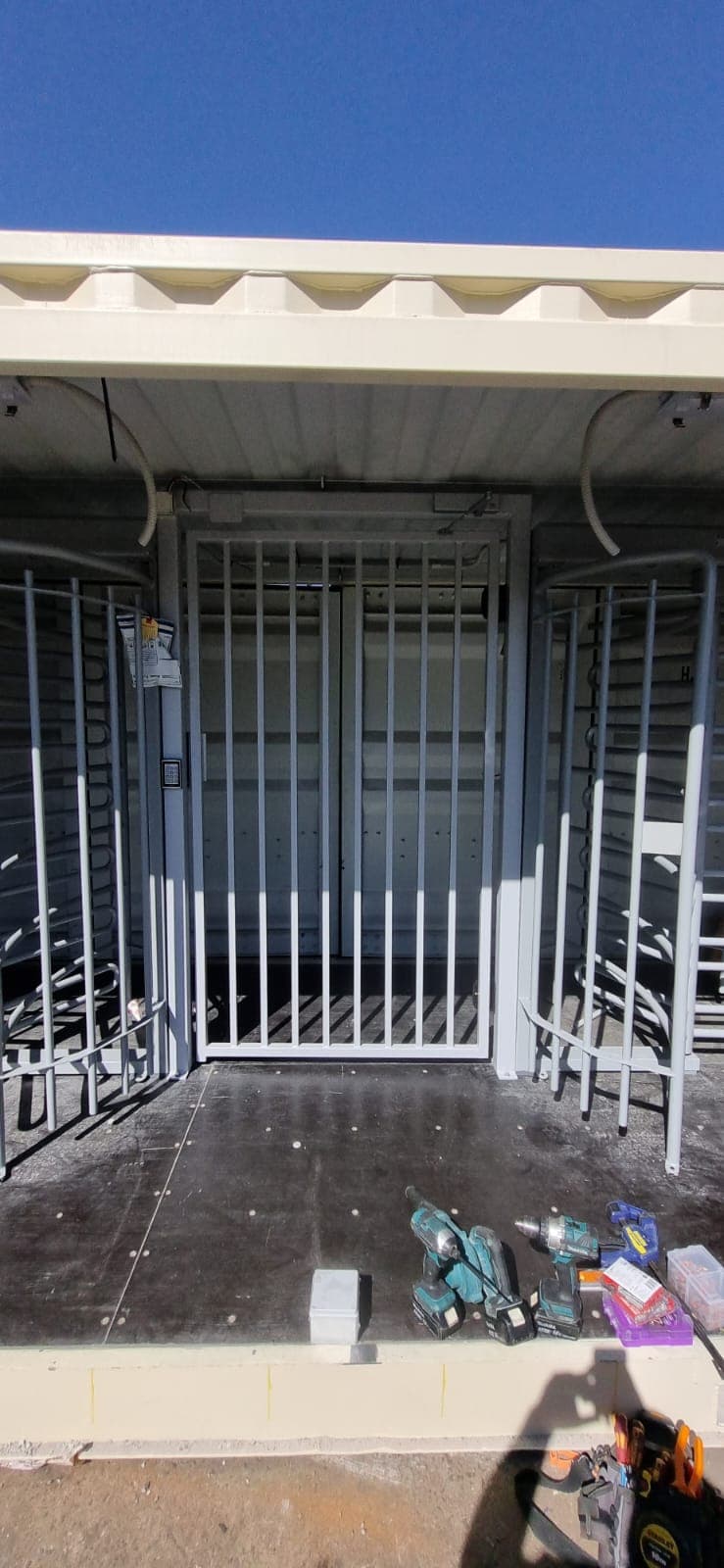 Controlled outdoor pedestrian entry with access equipment.