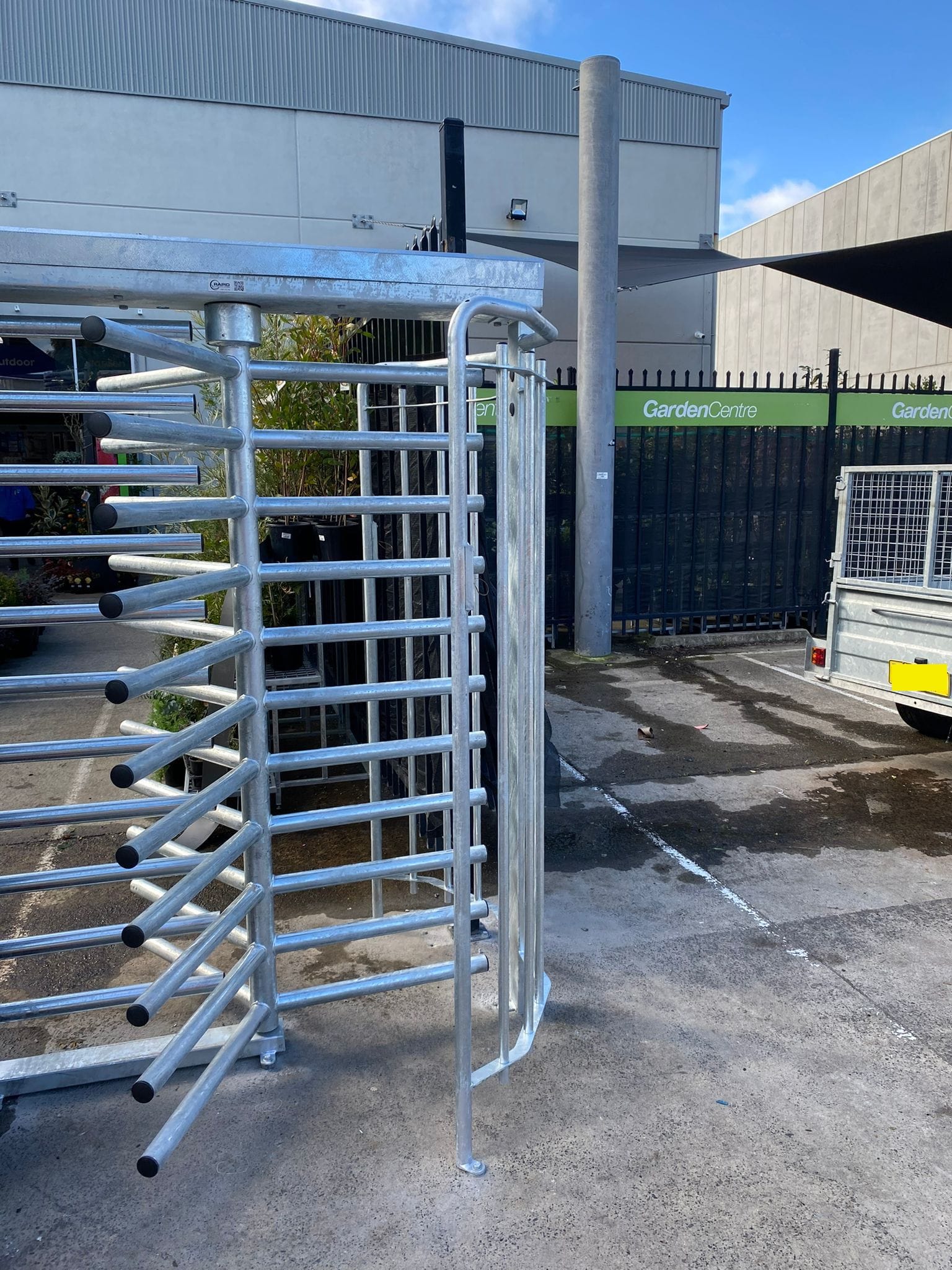 Full-height turnstile used for controlled pedestrian access.